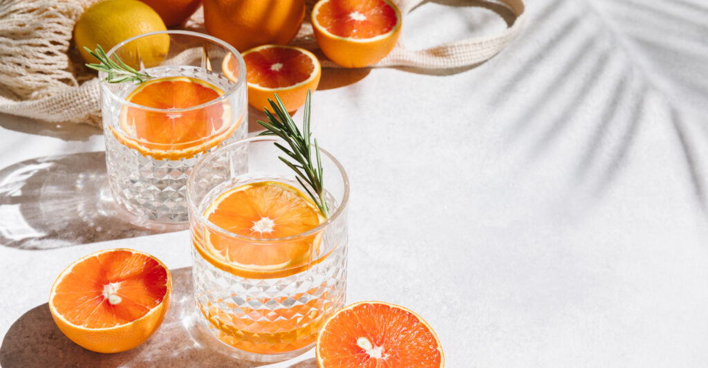 orange cocktails with fresh citrus fruits